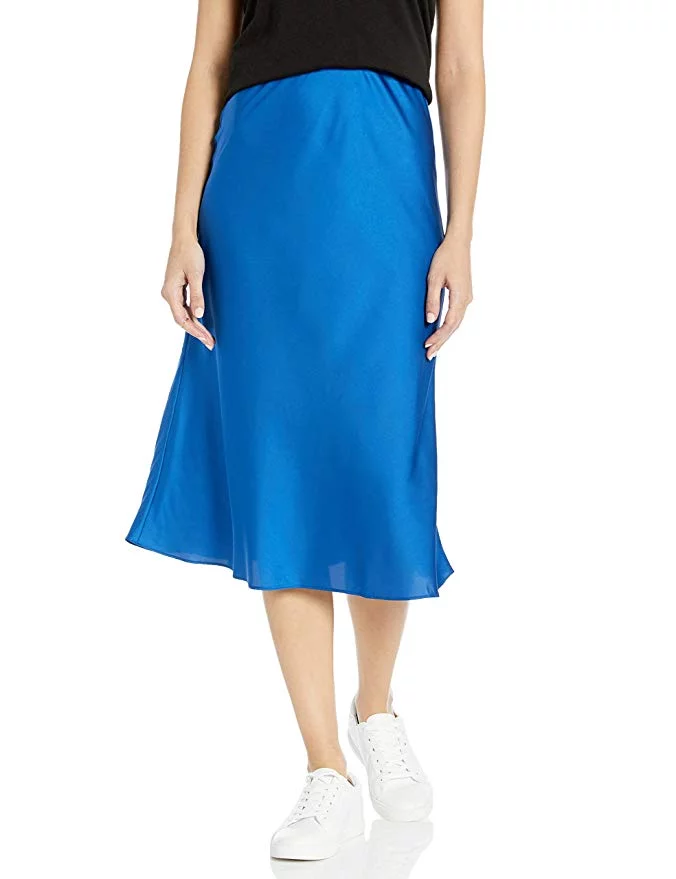 blue Brick Rekucci Women's Stretch Pencil Skirt styled for a professional workplace setting, highlighting its elegant fit and versatility for office wear.