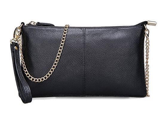 Elegant black leather clutch for women with a sleek, smooth finish and a minimalist design, perfect for formal events or evening outings.